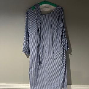 Preppy Blue and white stripped dress with pockets and sleeves .